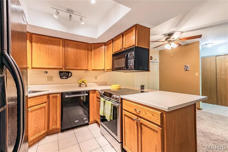 You'll love meal prep in this well-designed kitchen space. — 1440 Heritage Landing #105, St Charles, MO 63303