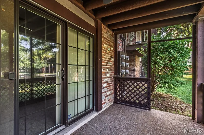 Screened patio off bedroom — 1440 Heritage Landing #105, St Charles, MO 63303
