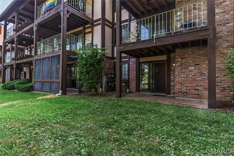 View looking toward the unit and building — 1440 Heritage Landing #105, St Charles, MO 63303