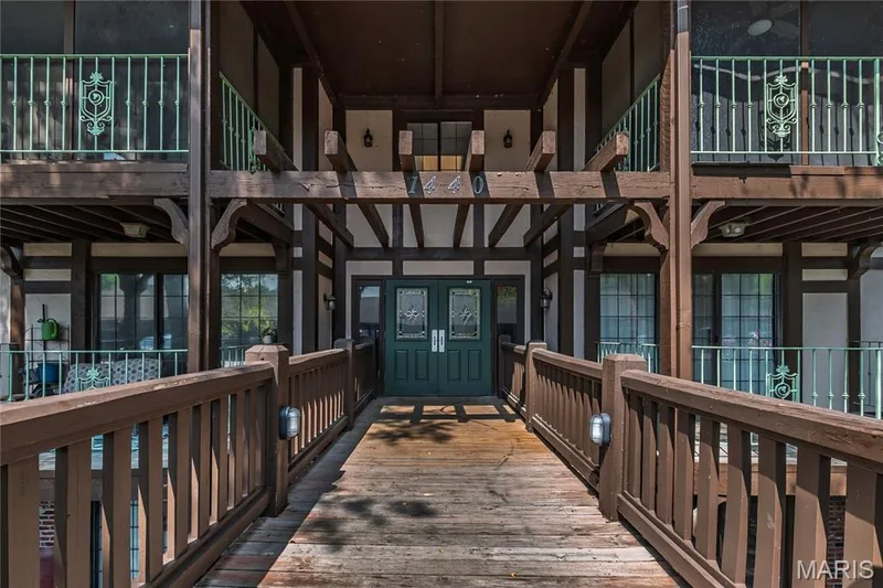 Front entrance from parking lot — 1440 Heritage Landing #105, St Charles, MO 63303