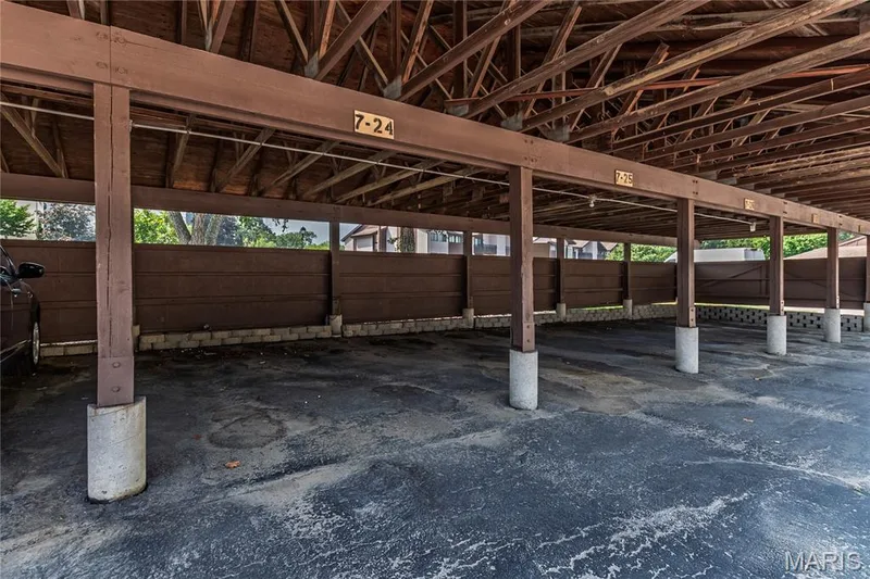 The unit includes carport space R-24. — 1440 Heritage Landing #105, St Charles, MO 63303
