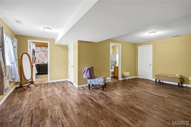 Family Room - Flex space with full Bath. Look-out windows — 2029 Chapel Hill Crossing, St Peters, MO 63376