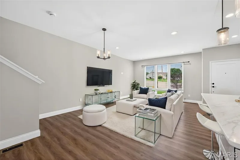 Huge Living Room w/ Upgraded Lighting throughout. (Virtual Decorating Elements & Furniture) — 2810 McClay Road, St Charles, MO 63303