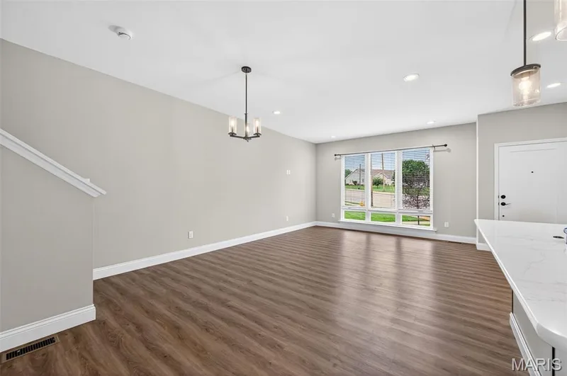 Beautiful LVP flooring. Open living space. Breakfast Bar. Recessed Lighting. — 2810 McClay Road, St Charles, MO 63303