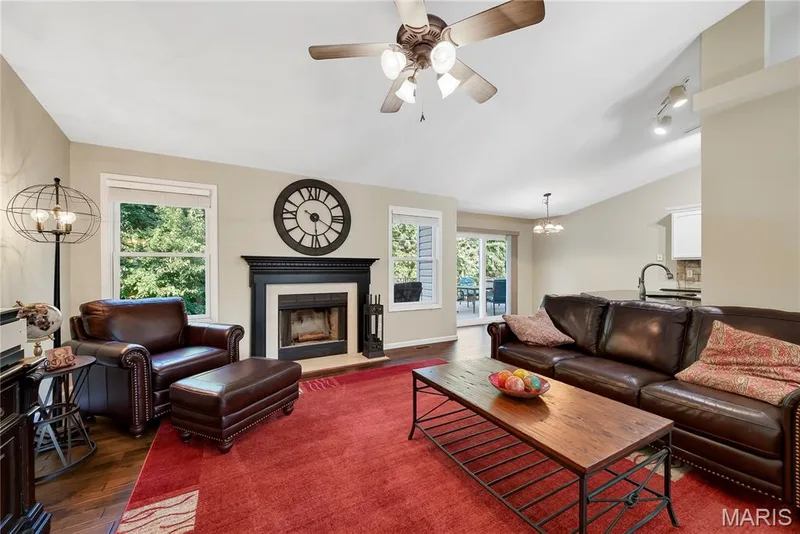 Wood Burning Fireplace with Marble Surround in Great Room — 167 Rightfield Drive, O'Fallon, MO 63366