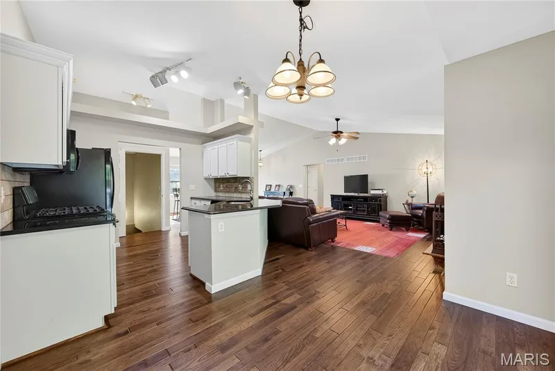 Open Floor Plan, Vaulted Ceilings and Wood Flooring in Main Living Space — 167 Rightfield Drive, O'Fallon, MO 63366