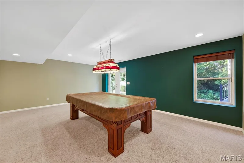 Rec Room in Walk Out Finished Lower Level.  The Pool Table is Included. — 167 Rightfield Drive, O'Fallon, MO 63366