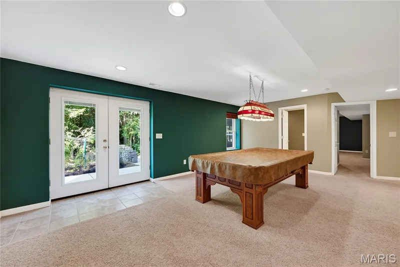 Rec Room in Walk Out Finished Lower Level.  The Pool Table is Included. — 167 Rightfield Drive, O'Fallon, MO 63366