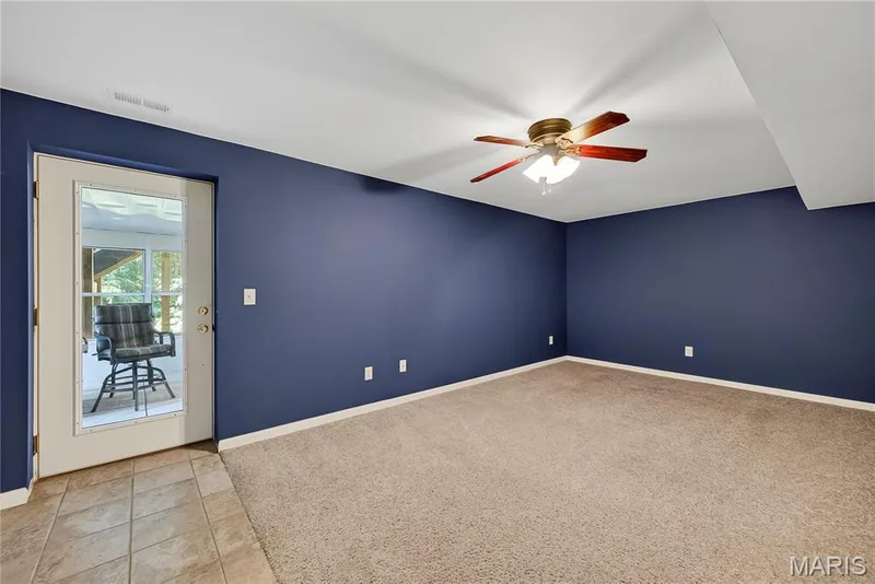 Bedroom with Atrium Door to Sunroom/ Screened in Patio — 167 Rightfield Drive, O'Fallon, MO 63366
