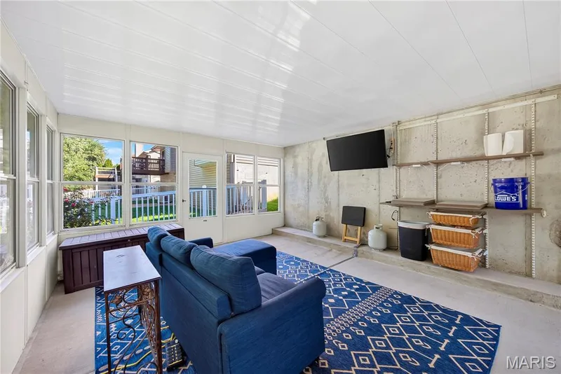 Screened in Patio/Sunroom with Doors to Backyard on Either Side — 167 Rightfield Drive, O'Fallon, MO 63366