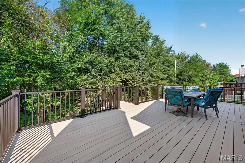 Composite Deck with Aluminum Rails Overlooking Tree Lined Yard — 167 Rightfield Drive, O'Fallon, MO 63366