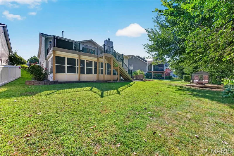 Rear Elevation with Composite Deck with Steps to Yard — 167 Rightfield Drive, O'Fallon, MO 63366