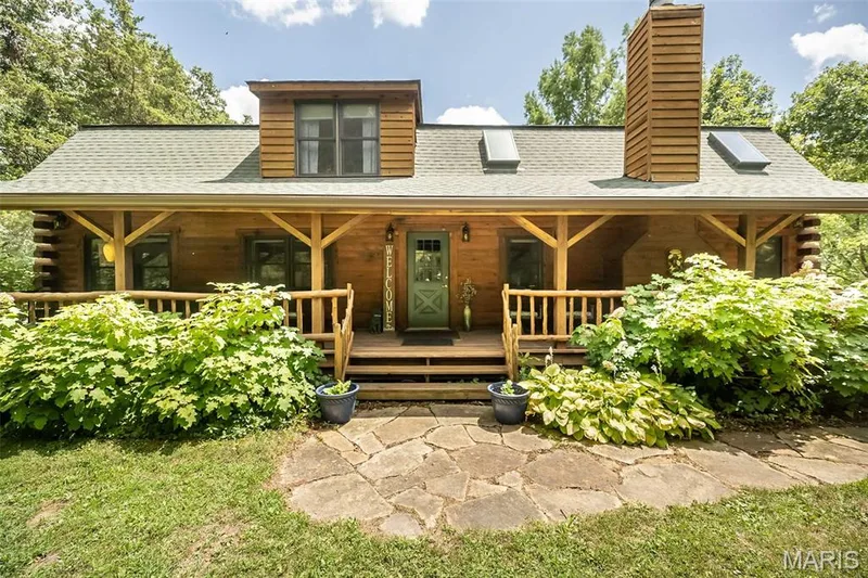 Covered front porch overlooking mature trees! — 8 Whippoorwill Court, Defiance, MO 63341
