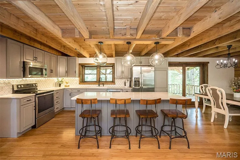 Fully updated kitchen with expansive island — 8 Whippoorwill Court, Defiance, MO 63341