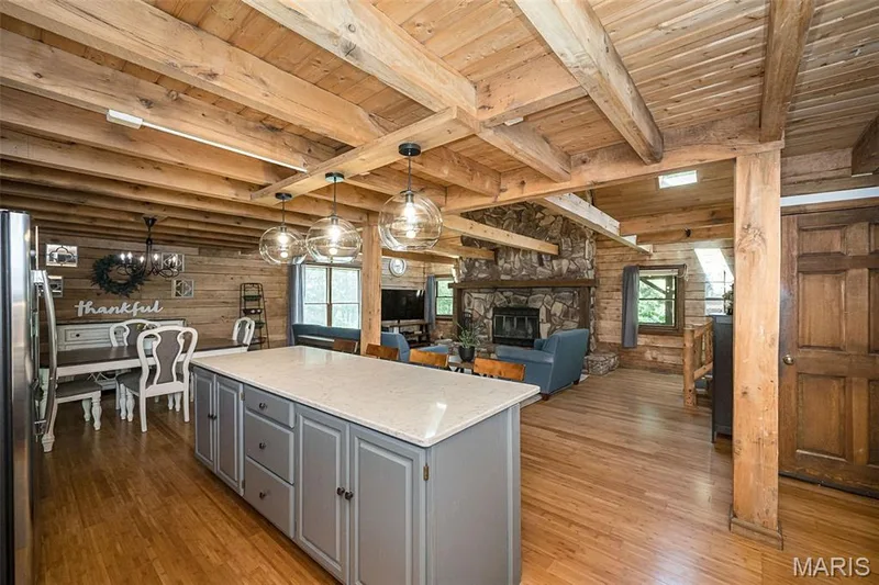 Open floor plan. You can cook and have the cozy fireplace going. — 8 Whippoorwill Court, Defiance, MO 63341