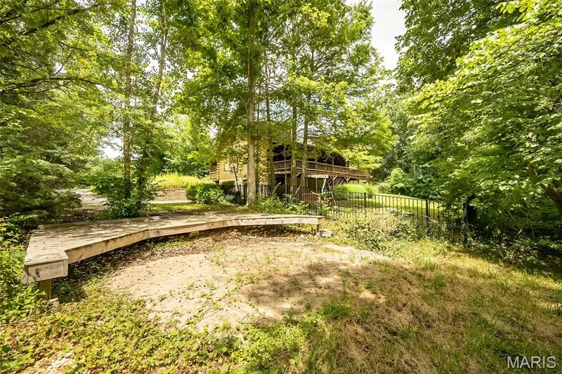 If a pool is not your jam, this is a great area for a firepit and chairs! — 8 Whippoorwill Court, Defiance, MO 63341