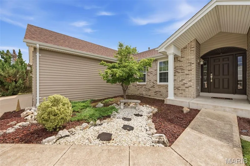 Tasteful and low maintenance landscaping — 214 Charging Bear Drive, Wentzville, MO 63385