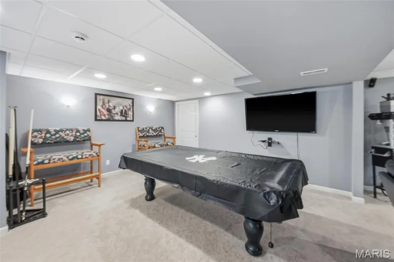 Pool table is excluded BUT this area sure makes for a great game room! — 214 Charging Bear Drive, Wentzville, MO 63385