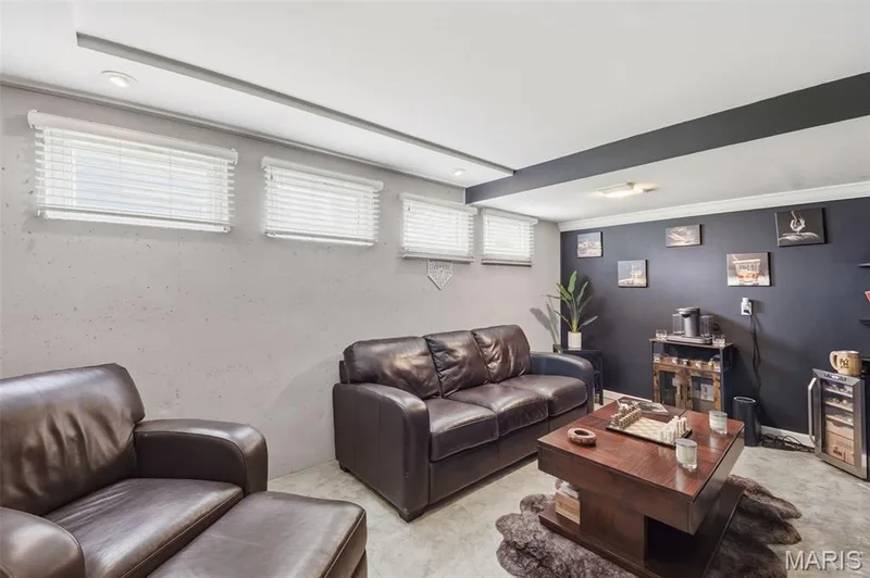 This den makes for an easy tuck away space for office or hobby room or man cave — 214 Charging Bear Drive, Wentzville, MO 63385