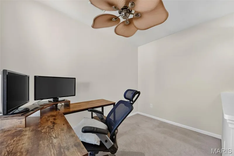 Loft/Office area featuring light neutral wall paint and carpeted flooring — 916 Carpathian Drive, Lake St. Louis, MO 63367