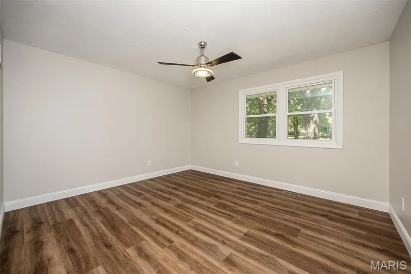 Primary bedroom updated flooring and windows — 5935 Lafayette Drive, Weldon Spring, MO 63304