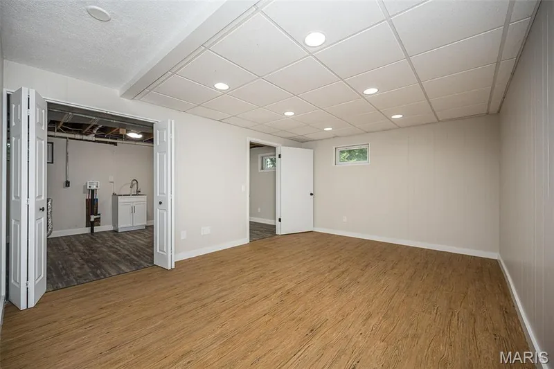 Rec room looking into the laundry room — 5935 Lafayette Drive, Weldon Spring, MO 63304
