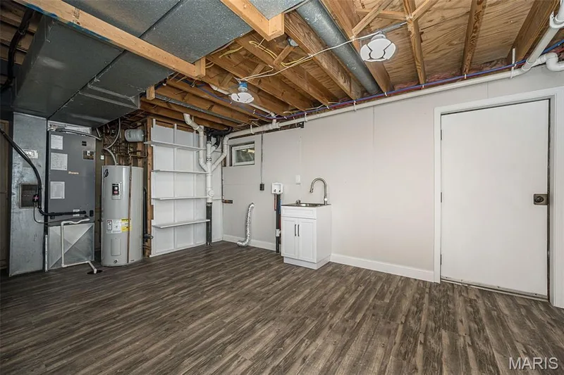 Laundry room and door to backyard — 5935 Lafayette Drive, Weldon Spring, MO 63304