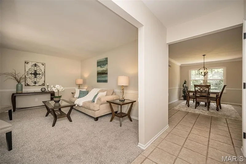 Living room and entryway to Dining room — 5927 Lafayette Drive, Weldon Spring, MO 63304