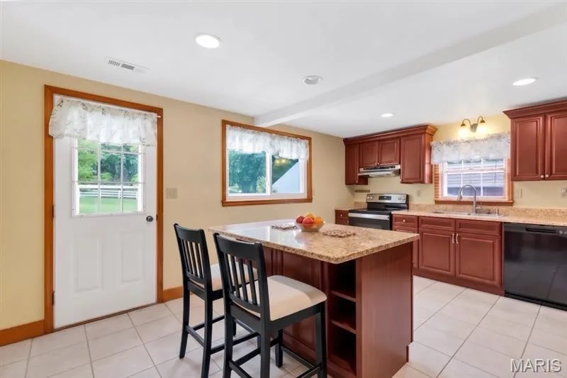 Virtually Staged Kitchen — 2365 Saint Paul Road, St Paul, MO 63366