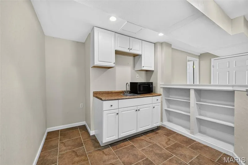 Wet bar in basement — 4425 Millcroft Drive, St Charles, MO 63304