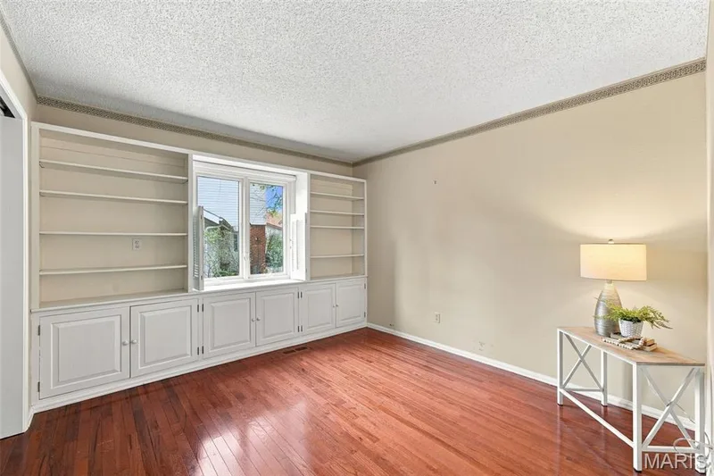 Bedroom #1 includes built-ins, hardwood floors and large closet — 2176 Parasol Drive, Chesterfield, MO 63017
