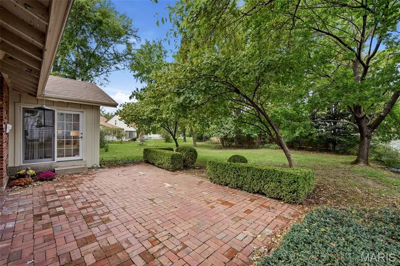 Large brick patio accessible from family room or primary bedroom. — 2176 Parasol Drive, Chesterfield, MO 63017