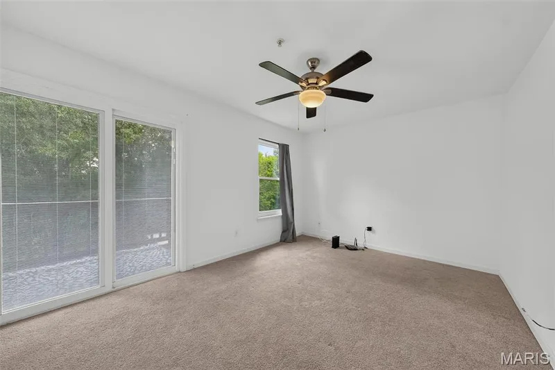 Walk in Closet, walks out to deck and has a primary bathroom with double sinks. — 101 Timber Creek Drive, O'Fallon, MO 63368