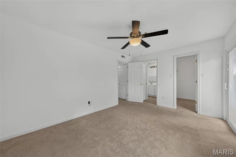 Walk in Closet, walks out to deck and has a primary bathroom with double sinks. — 101 Timber Creek Drive, O'Fallon, MO 63368