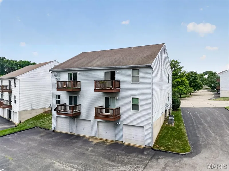 Left bottom deck and garage directly under belongs to this unit. — 101 Timber Creek Drive, O'Fallon, MO 63368