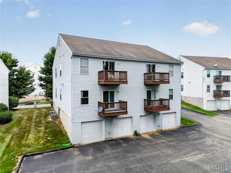Left bottom deck and garage directly under belongs to this unit. — 101 Timber Creek Drive, O'Fallon, MO 63368
