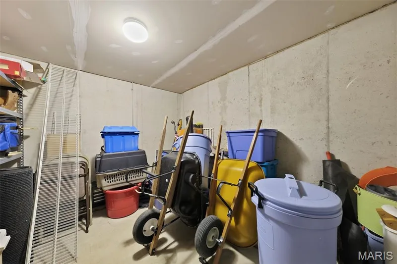 Storage in lower level. Shelving does not stay — 101 Timber Creek Drive, O'Fallon, MO 63368