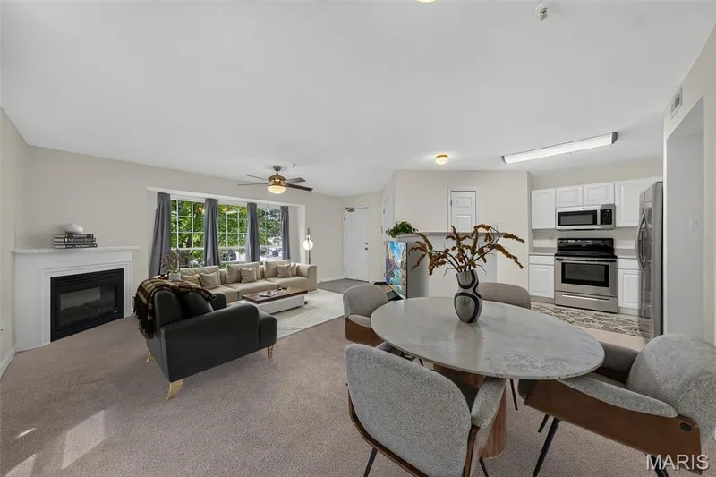 Virtually staged.  Electric fireplace, amazing windows. — 101 Timber Creek Drive, O'Fallon, MO 63368