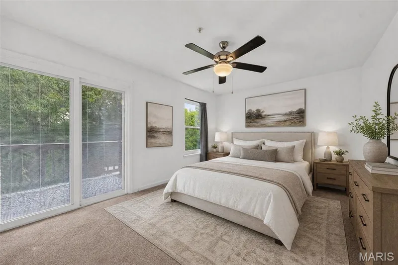 Virtually staged. Walk in Closet, walks out to deck and has a primary bathroom with double sinks. — 101 Timber Creek Drive, O'Fallon, MO 63368