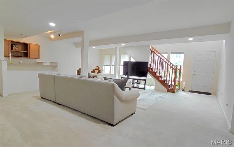 Lower Level - Wall of windows lite & britet  Large family room,  walk out to level backyard, — 15234 Brightfield Manor Drive, Chesterfield, MO 63017