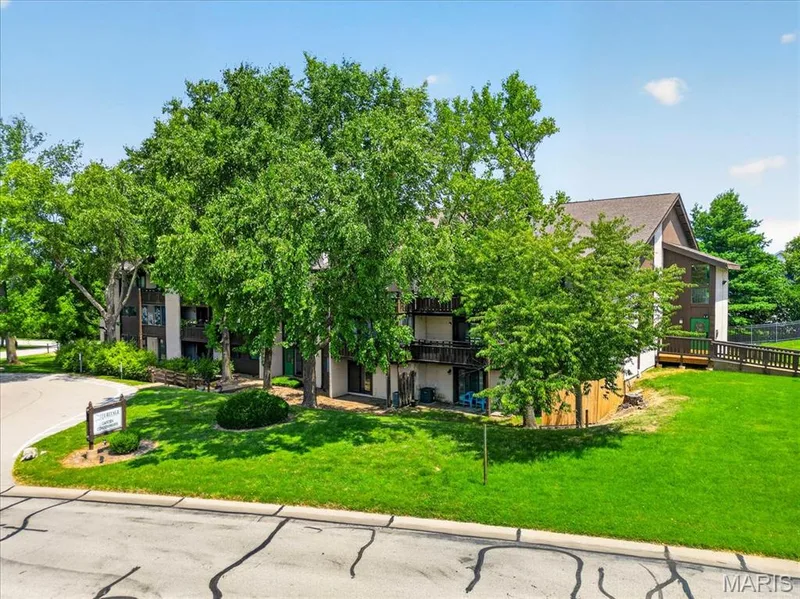 Lots of green space around this complex. — 1380 Heritage Landing #202, St Charles, MO 63303