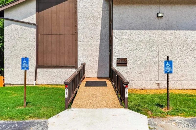 This is the no step entry into the building leading to the unit. — 1380 Heritage Landing #202, St Charles, MO 63303