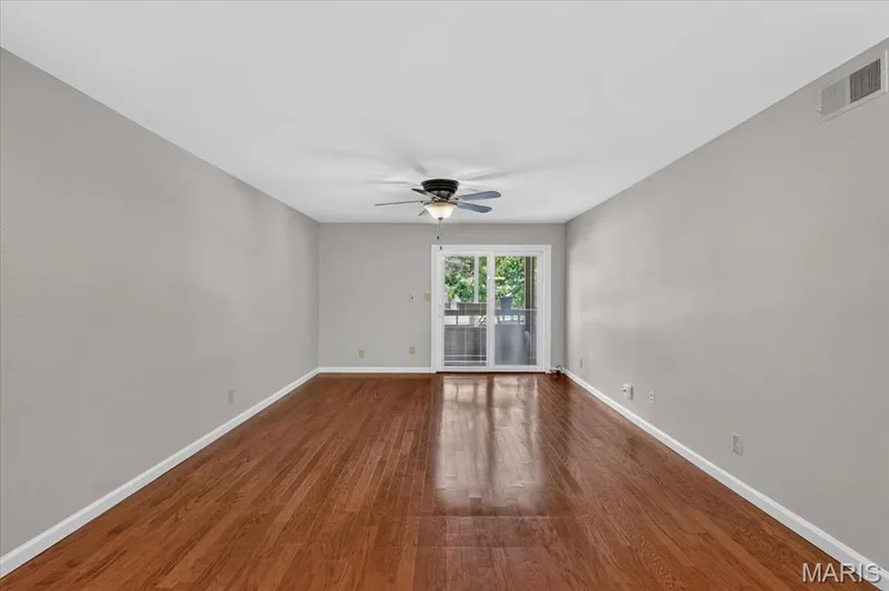 Living room is 20 x 13. — 1380 Heritage Landing #202, St Charles, MO 63303