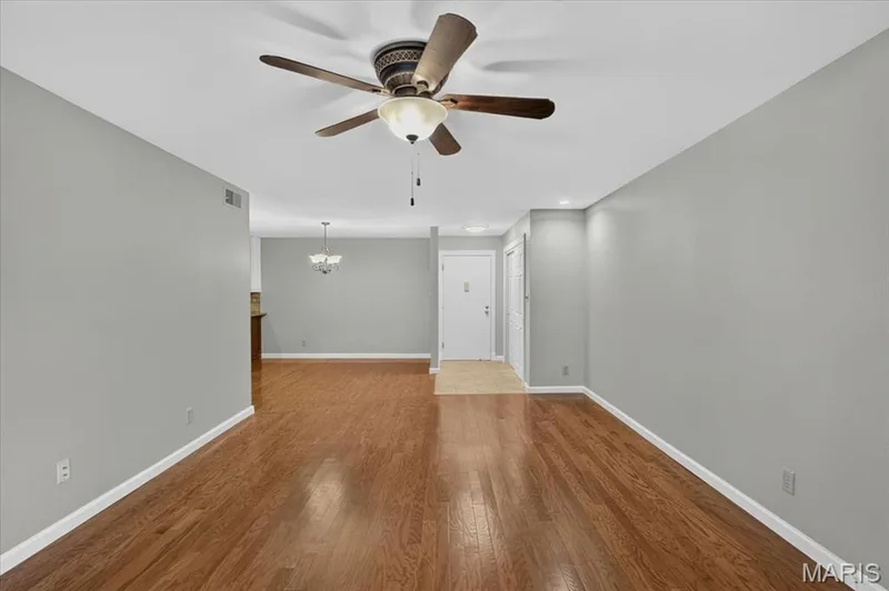 There are wood floors through-out most of the unit. — 1380 Heritage Landing #202, St Charles, MO 63303
