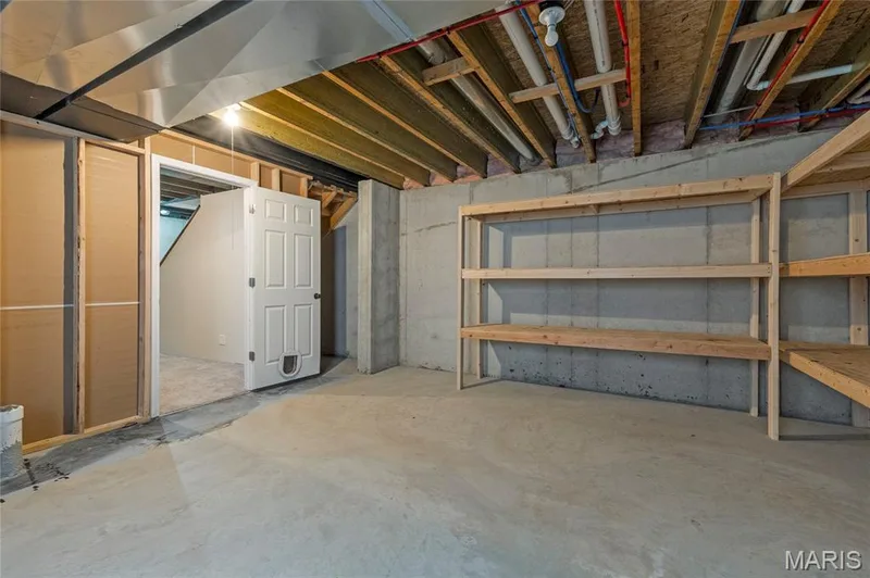 Unfinished basement space featuring exposed concrete walls and flooring — 3429 Sublette Street, St Charles, MO 63301