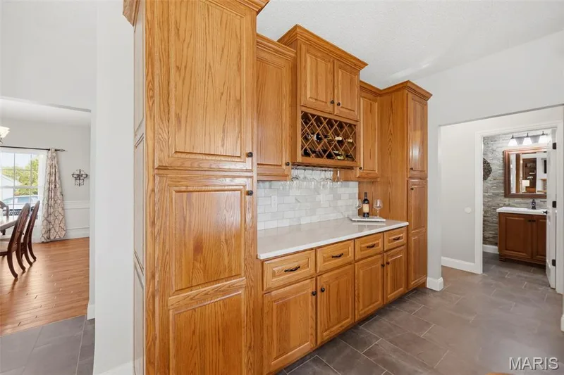 Custom cabinetry offers abundant storage and built-in wine storage — 2 Emmons Court #1294, O'Fallon, MO 63368