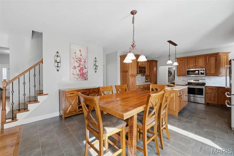 Large tile flooring in the breakfast room — 2 Emmons Court #1294, O'Fallon, MO 63368