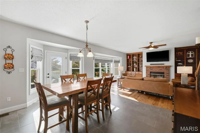 Breakfast room with door to back patio — 2 Emmons Court #1294, O'Fallon, MO 63368