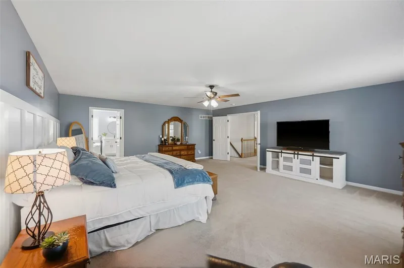 French door entry to primary suite — 2 Emmons Court #1294, O'Fallon, MO 63368