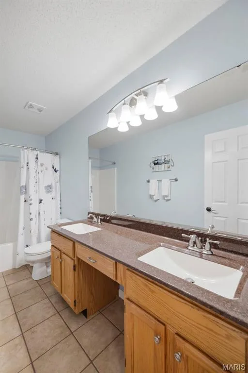 Full bath with double sinks — 2 Emmons Court #1294, O'Fallon, MO 63368